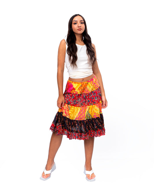 Five tiered Fabric mini ruffle skirt. In Multi.
