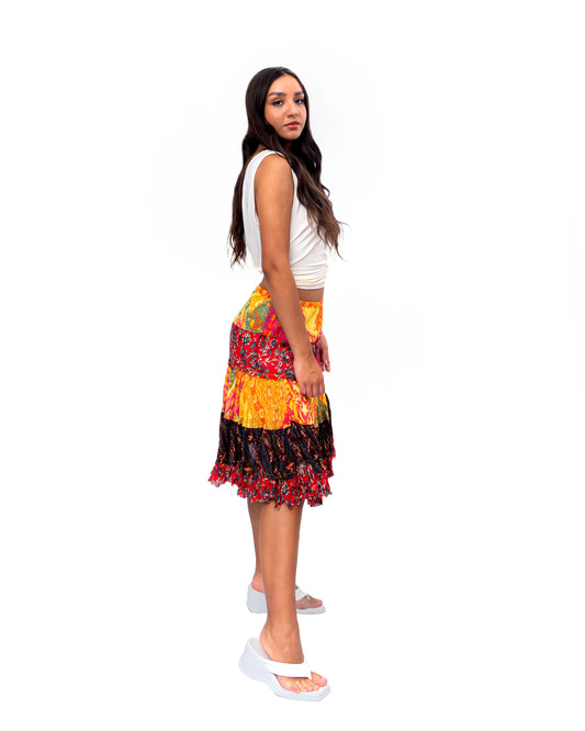Five tiered Fabric mini ruffle skirt. In Multi.